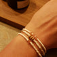 Armbandje Witte glaskraal met roze