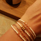 Armbandje Witte glaskraal met roze