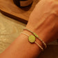 Witte glaskralen met groene schelp kraal